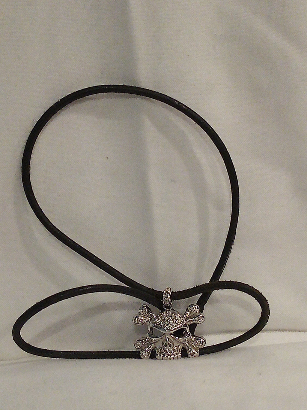 14K White Gold Diamond Skull Pendant on Cloth Cord