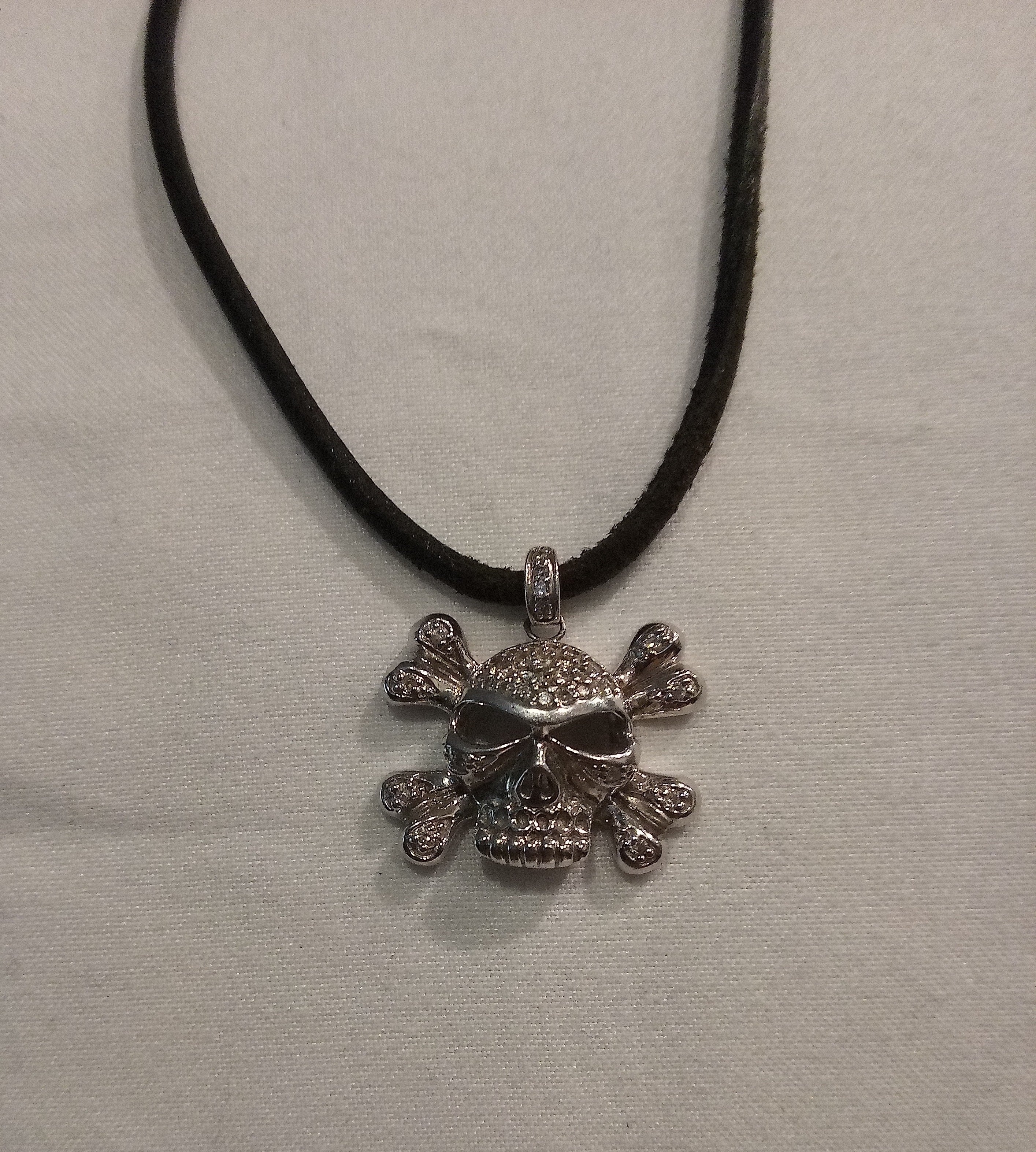 14K White Gold Diamond Skull Pendant on Cloth Cord